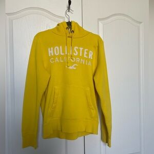Yellow Hollister hoodie, size Medium.